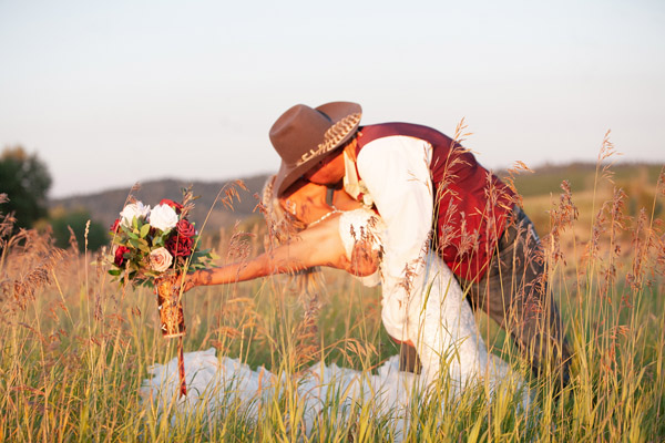 Bride And Groom Field Kiss